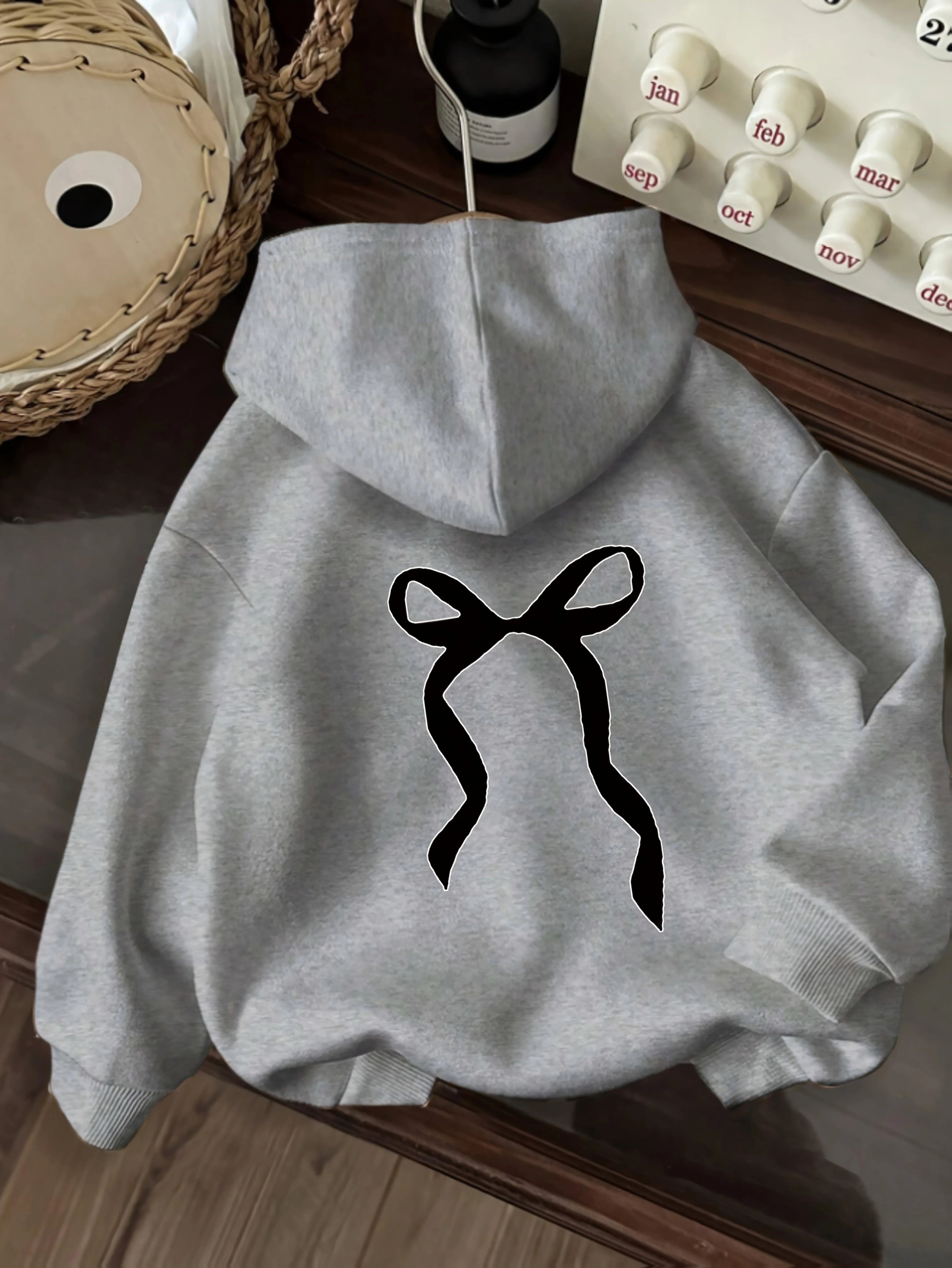 2025 Autumn and Winter Black Bow Print Simple Style Women's Long Sleeved Round Neck Comfortable Hoodies Casual Clothing